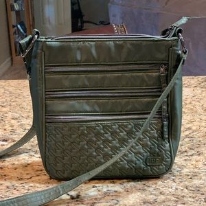 Lug breezer crossbody bag by Lug. Perfect size, not too bulky big, holds plenty.